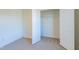 This is an empty walk-in closet includes white wire shelving at 285 Johnson Ridge Way, Four Oaks, NC 27524