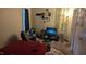 Bedroom includes a bed and TV on a console, creating a cozy living space at 311 Ashley Forest Rd # Bldg E, Chapel Hill, NC 27514