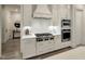 Well-equipped kitchen with stainless steel appliances, custom cabinets, and ample counter space for cooking at 3160 Mantle Ridge Dr, Apex, NC 27502