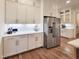 Beautiful kitchen with white cabinetry, stainless appliances, and a stylish design for culinary enthusiasts at 3160 Mantle Ridge Dr, Apex, NC 27502