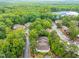 Aerial view of lush green landscape and houses at 320 Summerwalk Cir, Chapel Hill, NC 27517