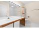 Bathroom featuring a wood-trimmed vanity and sink, toilet, and recessed medicine cabinet at 320 Summerwalk Cir, Chapel Hill, NC 27517