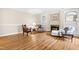 Comfortable living room featuring wood floors, a fireplace, and elegant decor at 320 Summerwalk Cir, Chapel Hill, NC 27517