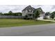 Attractive home with a well-manicured lawn, a two-car garage and complemented by a wooden perimeter fence at 33 Northlodge Ct, Wendell, NC 27591