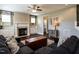Relaxing living room with a fireplace, built-ins, and seamless flow to the rest of the home at 33 Northlodge Ct, Wendell, NC 27591