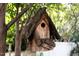 Rustic birdhouse hanging from a tree at 3307 Devon Rd, Durham, NC 27707