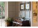 Interior view showing a wooden dresser with decorative pears, candles and framed art at 3307 Devon Rd, Durham, NC 27707