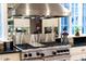 Close up of a professional grade gas range and stainless hood in a modern kitchen at 3307 Devon Rd, Durham, NC 27707