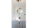 Bathroom featuring updated vanity, black fixtures, and updated lighting at 3317 E Jameson Rd, Raleigh, NC 27604