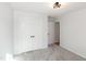 Clean bedroom with light gray carpet and crisp white trim at 3317 E Jameson Rd, Raleigh, NC 27604