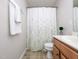 Bathroom with shower curtain, vanity, and updated fixtures at 3515 Mountain Brook Cir, Durham, NC 27704