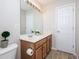 Bathroom with double sink vanity, large mirror, and updated fixtures at 3515 Mountain Brook Cir, Durham, NC 27704