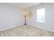Neutral bedroom with cozy carpeting, large window, and tasteful decor at 3515 Mountain Brook Cir, Durham, NC 27704
