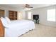 Bright bedroom with a ceiling fan and two windows allowing ample natural light at 3515 Mountain Brook Cir, Durham, NC 27704