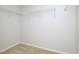 Walk-in closet featuring white wire shelving and neutral carpet at 3515 Mountain Brook Cir, Durham, NC 27704
