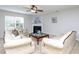 Inviting living room with neutral tones, plush seating, and a cozy fireplace perfect for relaxation and gatherings at 3515 Mountain Brook Cir, Durham, NC 27704