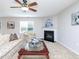 Comfortable living room features a fireplace, plush furniture, and ample natural light perfect for relaxation at 3515 Mountain Brook Cir, Durham, NC 27704
