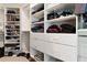 Organized walk-in closet with custom shelving and storage solutions at 3928 Bentley Bridge Rd, Raleigh, NC 27612
