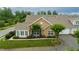 Attractive condo with stone front, lush landscaping and an attached garage at 425 Faith Dr, Gibsonville, NC 27249
