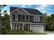 Charming two-story home featuring a two-car garage and lush landscaping, providing an inviting curb appeal at 523 Claftin St, Sanford, NC 27330