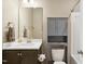 Bathroom featuring a vanity with storage, a large mirror, and a combination tub and shower at 5910 Giddings St, Raleigh, NC 27616