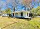 Charming single-story home featuring a welcoming front porch and well-maintained yard, perfect for relaxing outdoors at 602 Dexter St, Rocky Mount, NC 27803