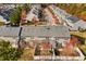 Aerial view of townhomes showcasing well-manicured lawns and tree-lined streets at 635 Grace Hodge Dr, Cary, NC 27519