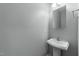 This clean bathroom contains a white sink with a silver faucet and a mirror at 635 Grace Hodge Dr, Cary, NC 27519