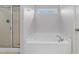 Bright bathroom features a soaking tub with tile surround, glass door shower, and natural light at 635 Grace Hodge Dr, Cary, NC 27519