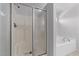 Bathroom features a shower with sliding doors and a bathtub at 635 Grace Hodge Dr, Cary, NC 27519