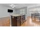 Gourmet kitchen with island with granite countertop and stainless steel dishwasher at 635 Grace Hodge Dr, Cary, NC 27519