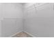 Walk-in closet with carpet floors, white wire shelving, and neutral walls at 635 Grace Hodge Dr, Cary, NC 27519