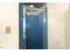 Modern bathroom with a frosted glass shower door and blue accents at 6517 Whitted Rd, Fuquay Varina, NC 27526