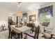 An elegant dining room with vintage furniture and an open view at 6517 Whitted Rd, Fuquay Varina, NC 27526