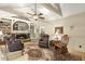 An elegant living room featuring a brick fireplace and cozy seating area at 6517 Whitted Rd, Fuquay Varina, NC 27526