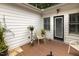 Covered back porch and potted plants at 6517 Whitted Rd, Fuquay Varina, NC 27526