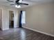 Bedroom featuring wood-look flooring, neutral paint, and access to an ensuite bathroom at 803 Flat Rock Church Rd, Louisburg, NC 27549