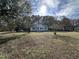 Quaint single-story home featuring an inviting entrance and an expansive yard at 803 Flat Rock Church Rd, Louisburg, NC 27549