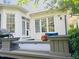 Outdoor living on private deck, a cozy seating and a grill, perfect for entertaining at 8729 Valentine Ct, Raleigh, NC 27613