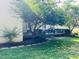 Private deck nestled in mature trees with outdoor seating and a built-in grill at 8729 Valentine Ct, Raleigh, NC 27613