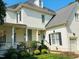 Exterior elevation with columns and garden at 8729 Valentine Ct, Raleigh, NC 27613