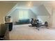 Home gym with window, fitness equipment and cabinets for storage at 8729 Valentine Ct, Raleigh, NC 27613