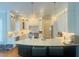 Bright kitchen features white cabinets, stainless steel appliances, granite countertops, and an island at 8729 Valentine Ct, Raleigh, NC 27613