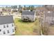 Large backyard with lush grass, screened-in porch, and room to roam at 930 Pristine Ln, Rolesville, NC 27571
