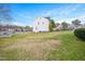 Expansive backyard with a view of the lake in the neighborhood at 930 Pristine Ln, Rolesville, NC 27571