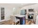 Kitchen with large center island and stainless steel appliances at 930 Pristine Ln, Rolesville, NC 27571
