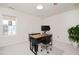 Modern home office with large window, modern desk setup, and natural light at 930 Pristine Ln, Rolesville, NC 27571