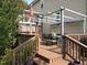 Outdoor living at its finest with a deck, pergola, and cozy dining area at 947 Middle Ground Ave, Rolesville, NC 27571