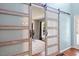 Stylish sliding barn doors, offering a unique entrance to the office space at 947 Middle Ground Ave, Rolesville, NC 27571