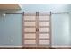 Modern sliding barn doors that give an open and airy feeling at 947 Middle Ground Ave, Rolesville, NC 27571